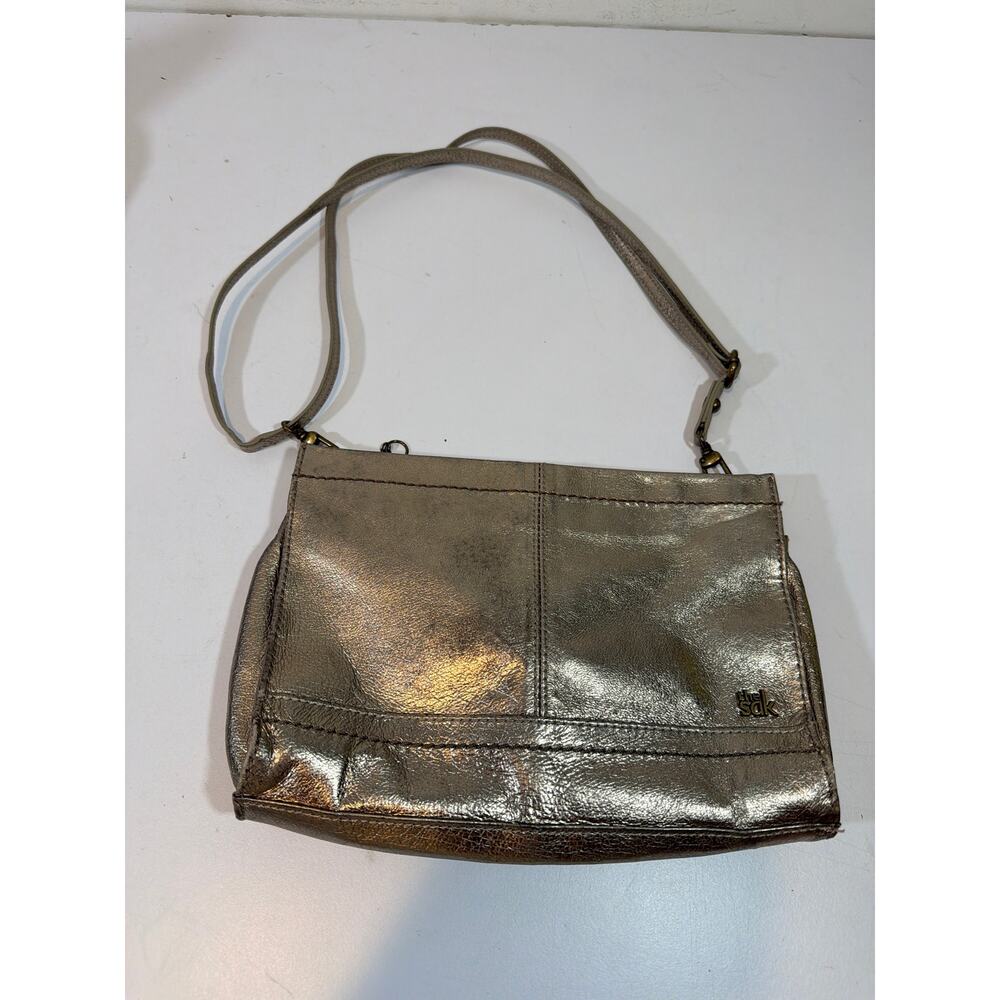 The SAK Iris Demi Clutch Metallic silver Leather Crossbody Messenger Bag Purse